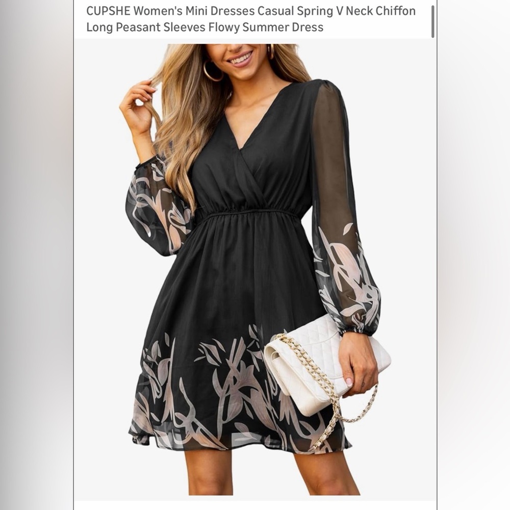 Classy cocktail party dress. Black with see through sleeves. Worn once